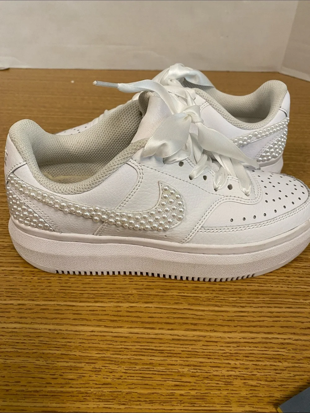 Nike White Platform Sneakers with Pearl Swoosh